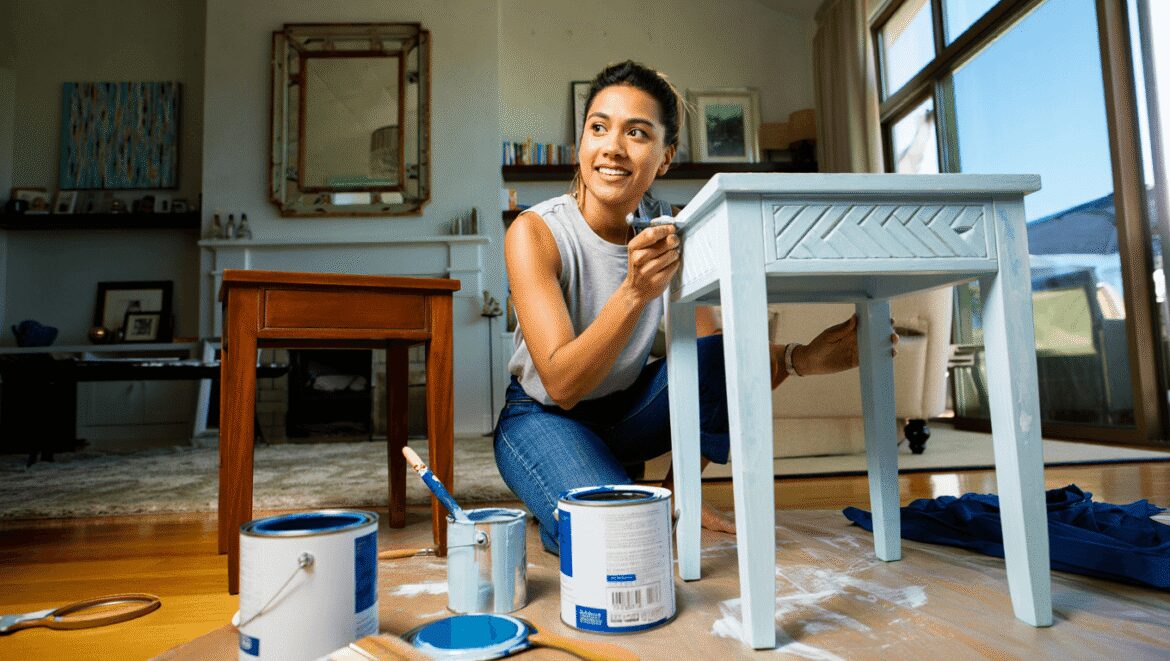 dining room with affordable DIY upgrades like wall trim, wallpaper, and a ceiling medallion 