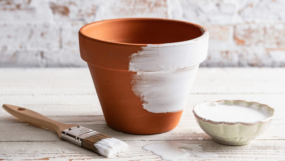 close up of a terra cotta pot that has been aged using garden lime