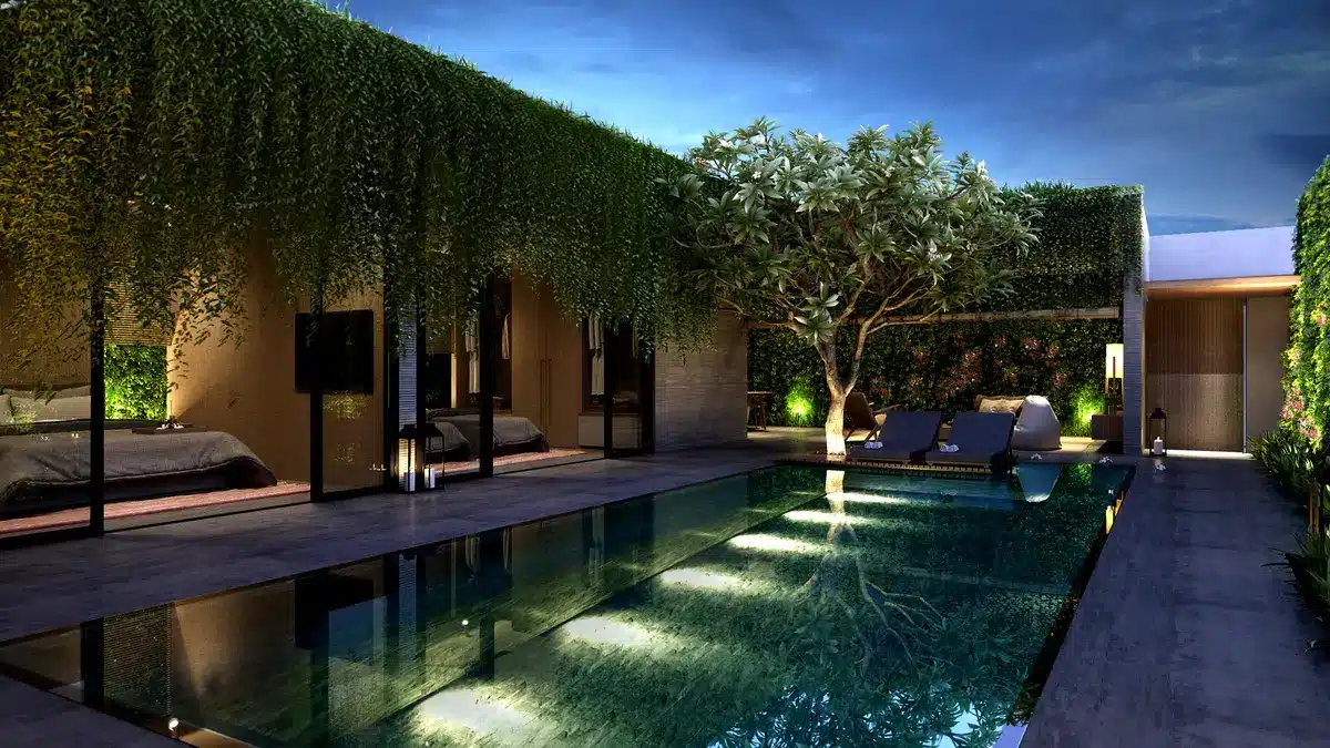 Terrasse contemporaine autour d'une piscine avec pavage et aménagement paysager harmonieux