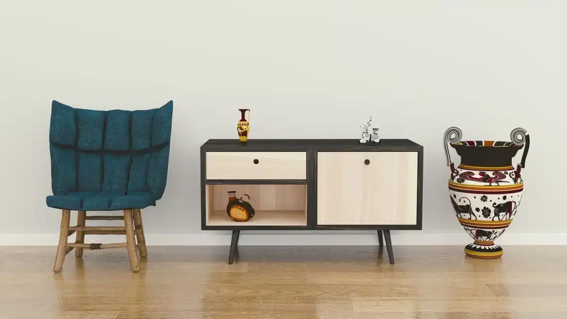 Mètre ruban et marquage au sol pour visualiser l'empreinte des meubles dans une pièce vide