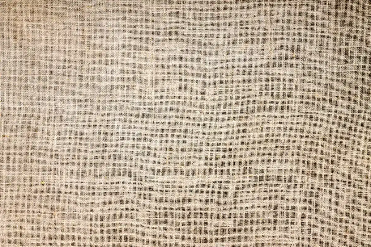 Échantillons de tissus coton, lin et polyester côte à côte